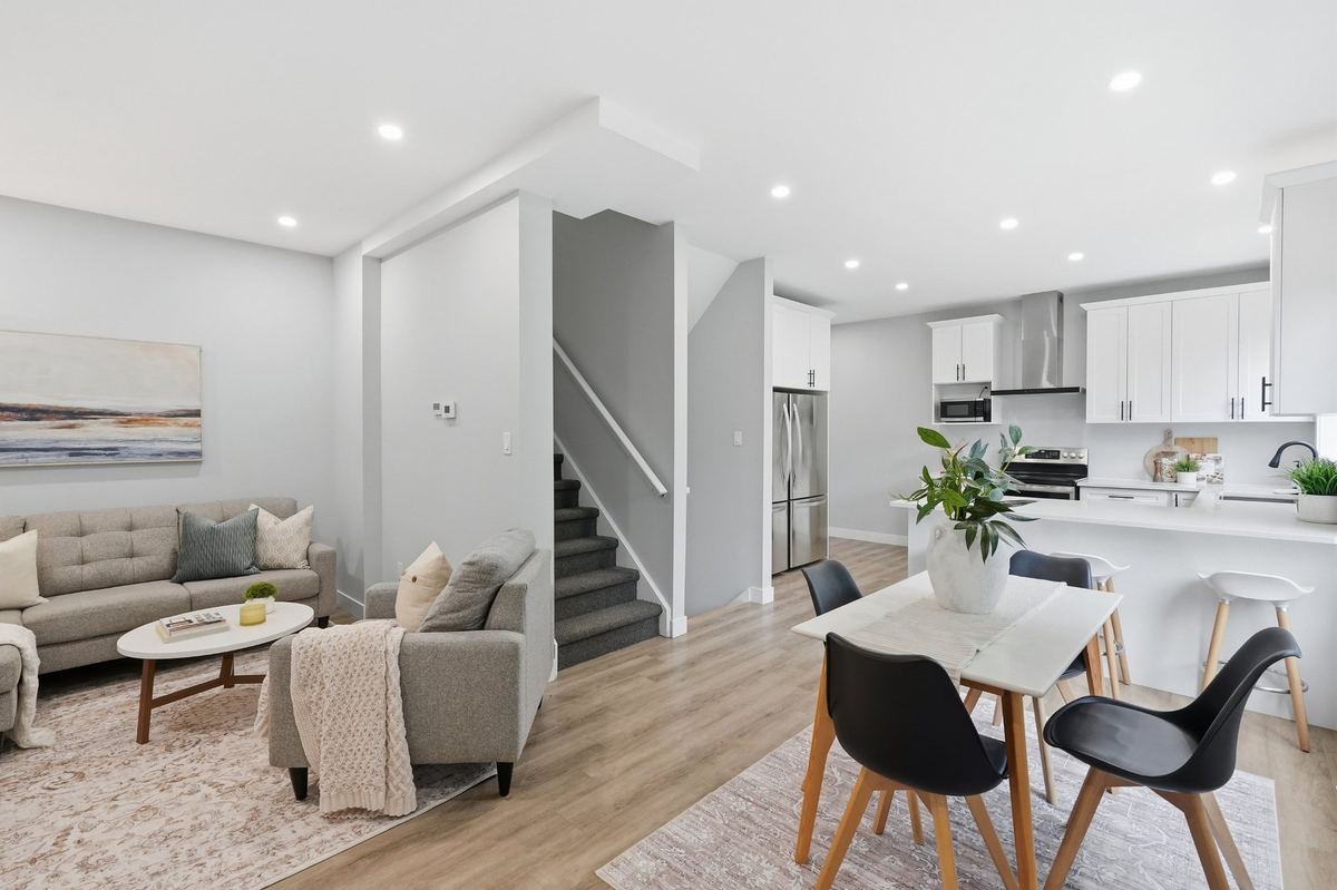 Open-concept living, dining and kitchen at Windermere Annex
