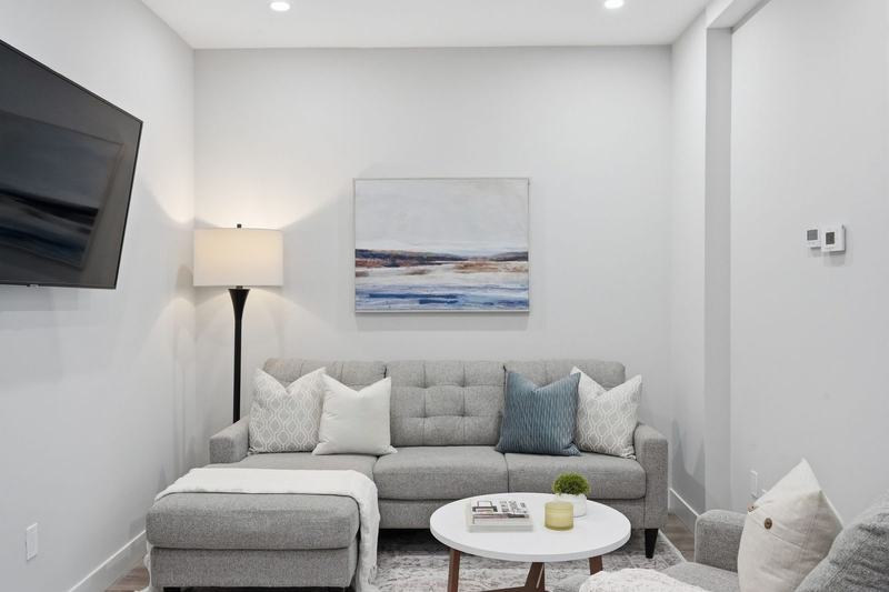 Furnished living room in a Windermere Annex student townhome